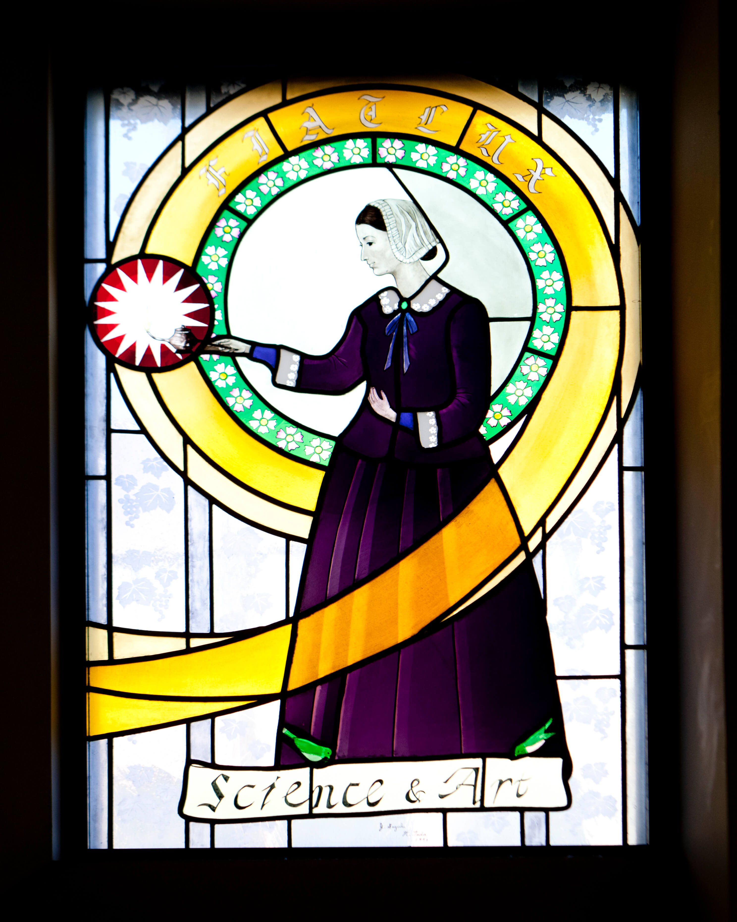 Nightingale stained glass in library