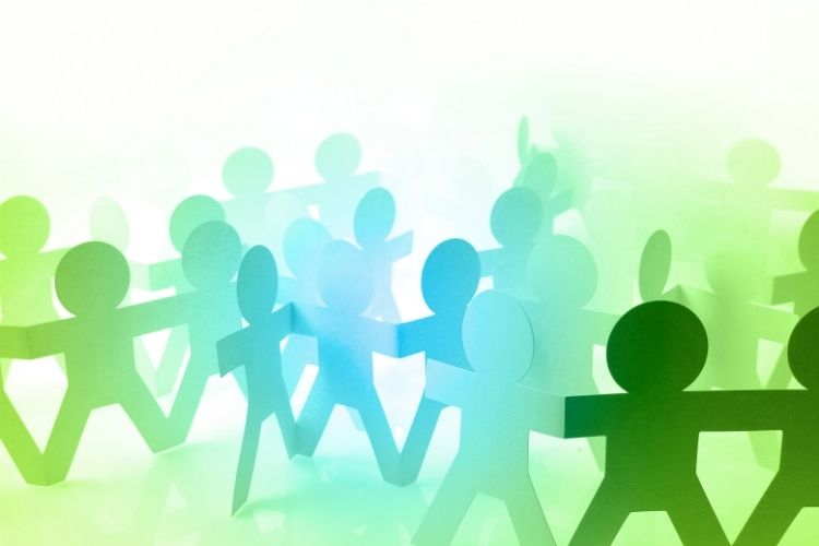 Paper cut-out people in shades of green