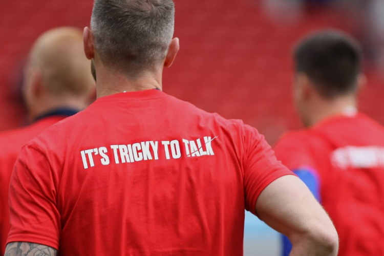 Nottingham Forest player wearing "It's tricky to talk" shirt