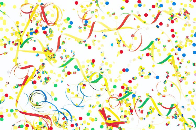 colourful streamers on a cream background